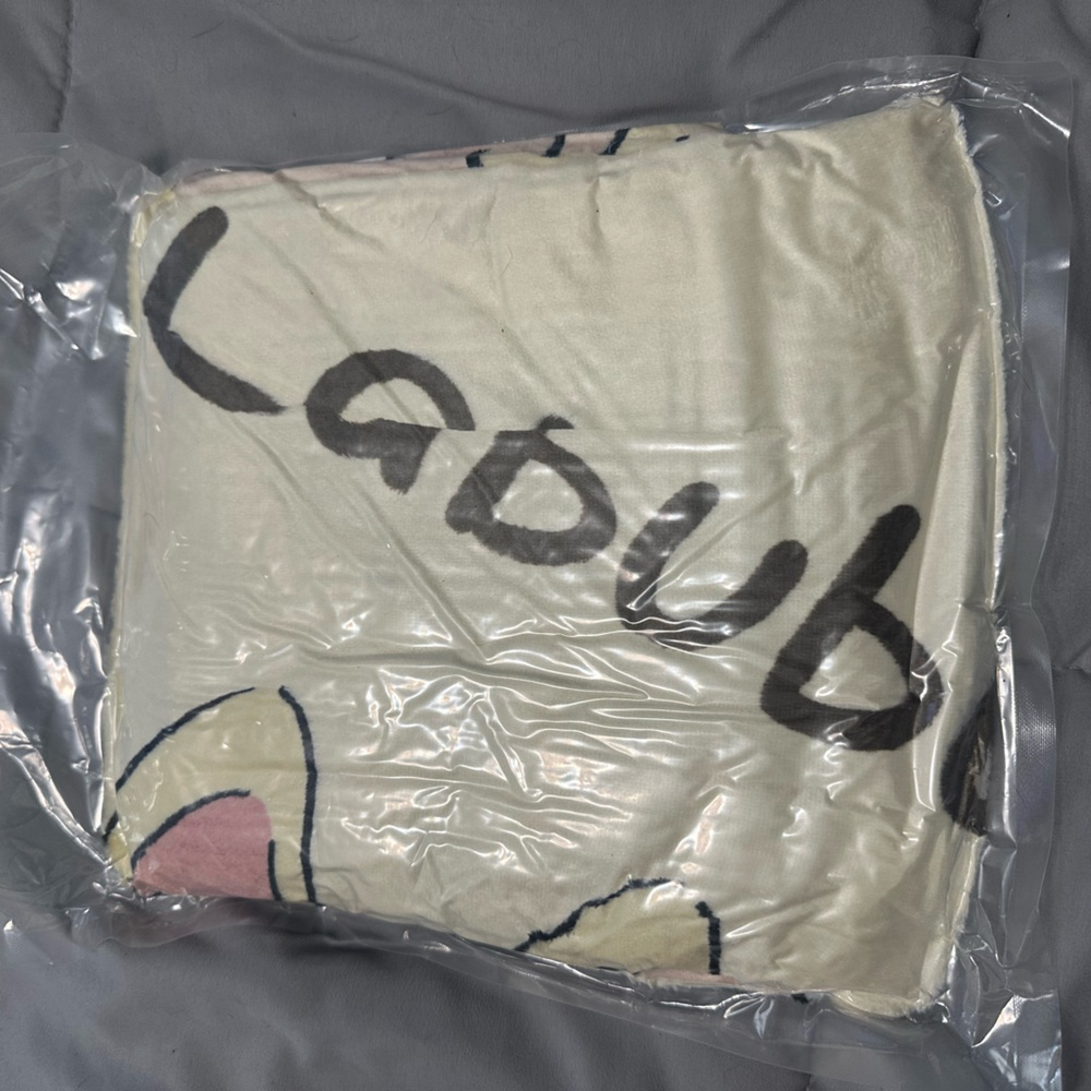 Cream Plush Throw Blanket with Black Script and Pink Accents